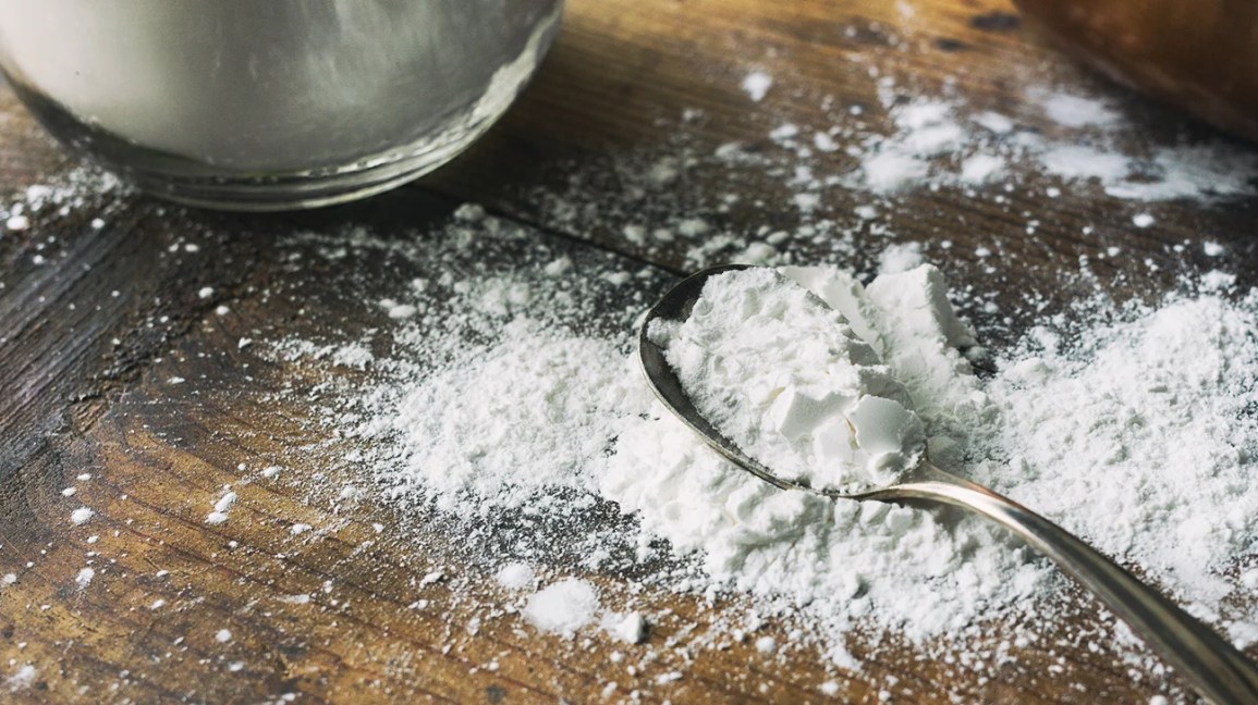arrowroot powder in a spoon on a countertop