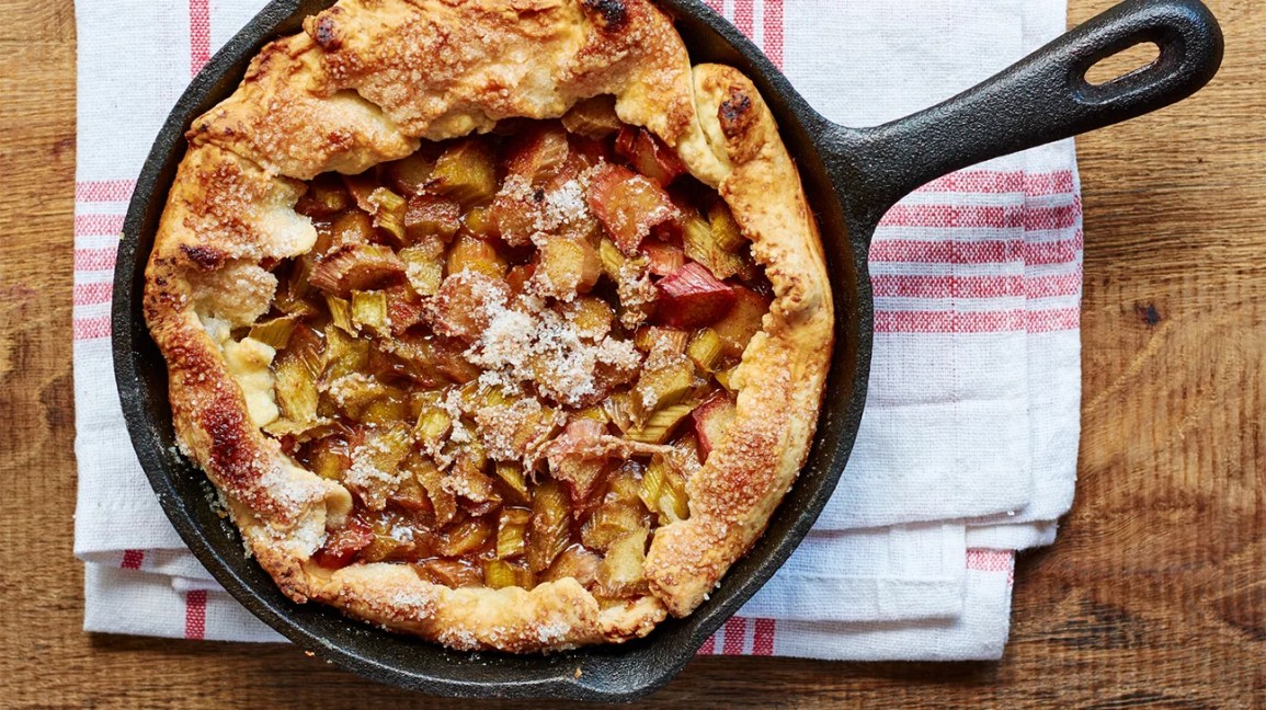 Rhubarb pie in a cast iron skillet.