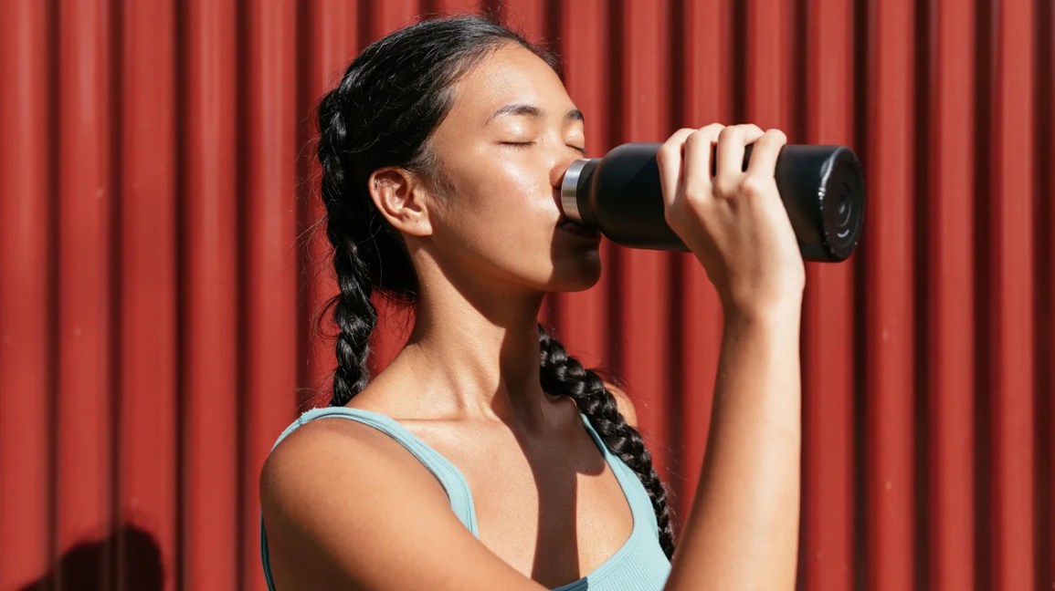 female drinking water