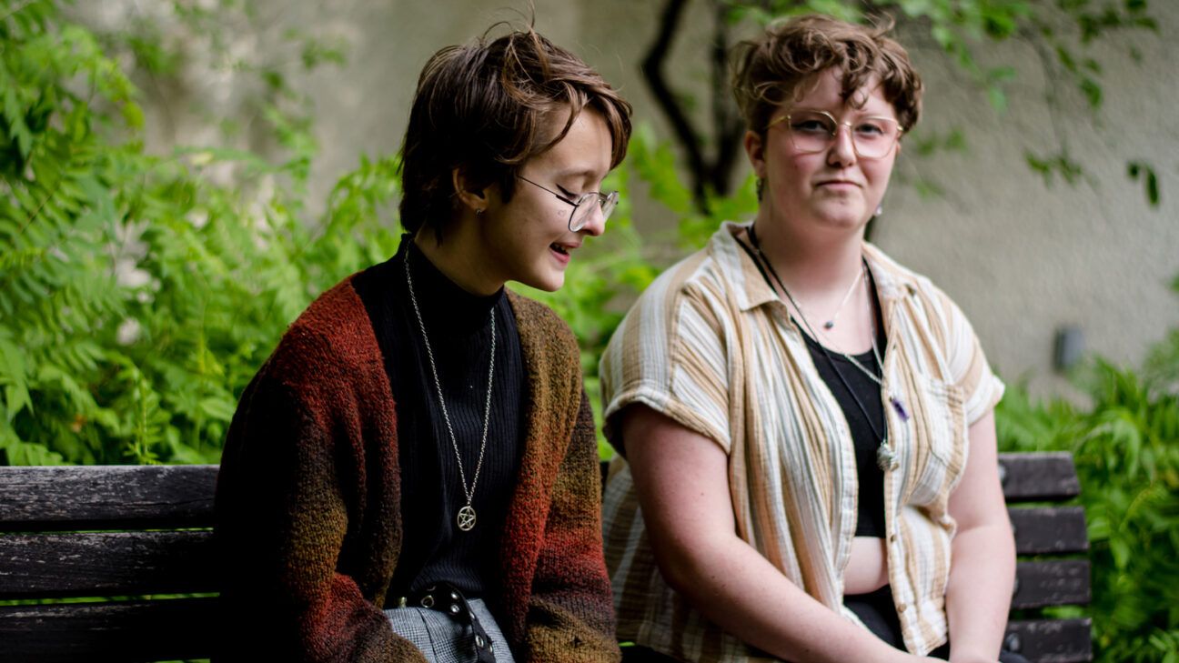 Two teenagers talking.